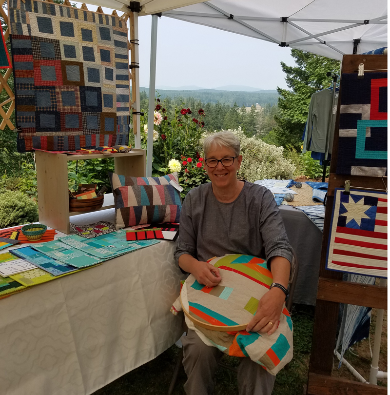 hand quilting during port townsend studio tour Marla Varner, penny lane quilts